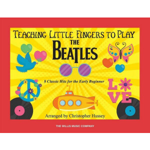 Teaching little Fingers to play The Beatles: